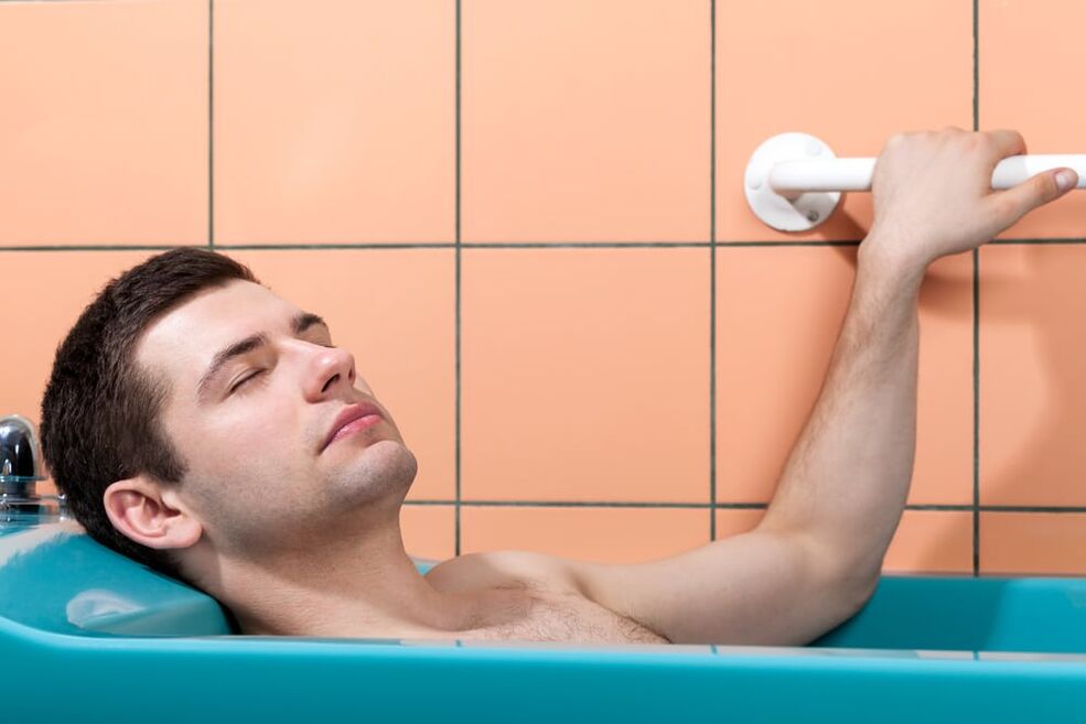 The man takes a bath with soda to enlarge his penis